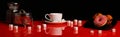 Panorama with a Cup of coffee, a donut and sugar on a red glossy table Royalty Free Stock Photo