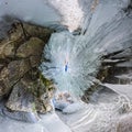 Panorama dawn in an ice cave with icicles on Baikal, Olkhon