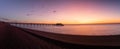 Panorama of Deal Pier and the beautiful beach during an amazing clear skies sunrise