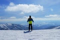 Panorama of Demanovska Valley in Slovakia Low Tatras. Skier is ready for rides. Child cannot get enough of this beautiful view.