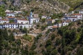 Panorama of Dhermi - attractive mountain village with school building church, Albania