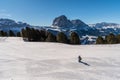 Panorama of Dolomites Alps, Val Gardena, Italy with lone person in the foreground