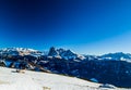 Panorama of the Dolomites with chalet, snow-capped peaks and co