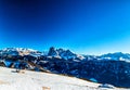 panorama of the Dolomites with chalet, snow-capped peaks and co