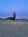 Panorama of the Donbass. Monument to the liberators of Donbass. Park of the Leninist Komsomol. Heaps on the horizon.