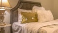 Panorama Double bed with fluffy pillows against the upholstered belgrave headboard