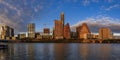 Panorama with downtown view across Lady Bird Lake or Town Lake on Colorado River at sunset golden hour, Austin Texas USA Royalty Free Stock Photo