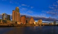 Panorama with downtown view across Lady Bird Lake or Town Lake on Colorado River at sunset golden hour, Austin Texas USA Royalty Free Stock Photo