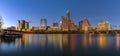 Panorama with downtown view across Lady Bird Lake or Town Lake on Colorado River at sunset golden hour, Austin Texas USA Royalty Free Stock Photo