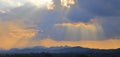 Panorama of dramatic ray of sunlight shines through the cloud with mountain view, Khaoyai, Thailand Royalty Free Stock Photo