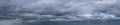 Panorama of dramatic sky with clouds before a thunderstorm. Dark abstract background Royalty Free Stock Photo