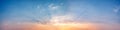 Panorama of Dramatic vibrant color with beautiful cloud of sunrise and sunset.