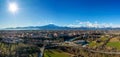 panorama drone view of Cuneo in the Itlaian Piedmont with snow-capped mountains behind