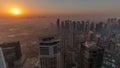 Panorama of Dubai Marina with JLT skyscrapers and golf course during sunrise timelapse, Dubai, United Arab Emirates. Royalty Free Stock Photo