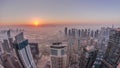 Panorama of Dubai Marina with JLT skyscrapers and golf course during sunrise timelapse, Dubai, United Arab Emirates. Royalty Free Stock Photo