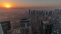 Panorama of Dubai Marina with JLT skyscrapers and golf course during sunrise timelapse, Dubai, United Arab Emirates. Royalty Free Stock Photo