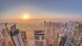 Panorama of Dubai Marina with JLT skyscrapers and golf course during sunrise timelapse, Dubai, United Arab Emirates. Royalty Free Stock Photo