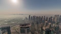 Panorama of Dubai Marina with JLT skyscrapers and golf course during sunrise timelapse, Dubai, United Arab Emirates. Royalty Free Stock Photo