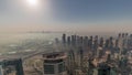 Panorama of Dubai Marina with JLT skyscrapers and golf course during sunrise timelapse, Dubai, United Arab Emirates. Royalty Free Stock Photo