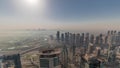 Panorama of Dubai Marina with JLT skyscrapers and golf course during sunrise timelapse, Dubai, United Arab Emirates. Royalty Free Stock Photo