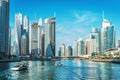 Panorama of Dubai Marina in UAE, modern skyscrapers and port with luxury yachts Royalty Free Stock Photo