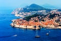 Panorama of Dubrovnik old city with many boats in front Royalty Free Stock Photo