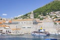 Panorama of Dubrovnik - view from sea with blue water of old town and harbor with yachts and