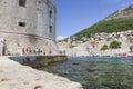 Panorama of Dubrovnik - view from sea with blue water of old town and harbor with yachts and