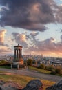 Panorama of Edinburgh against sunset with Calton Hill and castle in Scotland