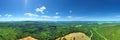 Panorama of the endless forest on sunny day. View from above