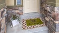 Panorama Entrance of a home with white wooden front door sidelight and transom window