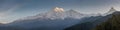 Panorama epic landscape view of beautiful Himalaya mountains covered with snow at Mardi Himal trekking area during sunrise Royalty Free Stock Photo