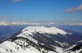 panorama of the European Alps mountain range in winter with snow-capped peaks without people with blue sky Royalty Free Stock Photo