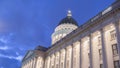 Panorama Facade of famous Utah State Capital Building glowing against vivid blue sky Royalty Free Stock Photo