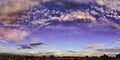 Panorama. Fairytale dawn, sunset with bright multi-colored clouds