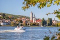 Panorama of Krems town with speed boat during summer time on Danube river in Wachau valley, Lower Austria, Austria