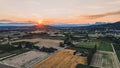 Panorama of farmland and mountain range during sunrise Loriol Sur Drome - Drome - France Royalty Free Stock Photo