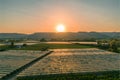 Panorama of the farmland and the mountain range during the sunset of Loriol Sur Drome - Drome - France Royalty Free Stock Photo