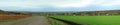 Panorama of fields, road and forest in autumn