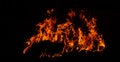 Panorama Fire flames on black background.global warming concept.Abstract background  sparks, dark glitter, light particles, light. Royalty Free Stock Photo