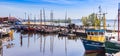 Panorama of fishing ships and sailing boats in the harbor of Urk