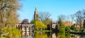 Panorama with Flemish style house reflecting in Minnewater lake, Bruges, Belgium Royalty Free Stock Photo