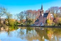 Panorama with Flemish style house reflecting in Minnewater lake, Bruges, Belgium Royalty Free Stock Photo