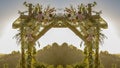 Panorama Flower and Chuppah at sunset in California wedding