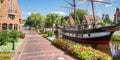 Panorama of flowers in front of the historic ship in Papenburg