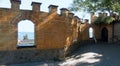 Window to the sea on a sunny medieval fortress wall, Odessa Ukraine Royalty Free Stock Photo