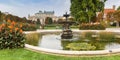 Panorama of a fountain and flowers in the Volksgarten park of Vienna