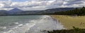 Panorama Four Mile Beach Port Douglas in Queensland Australia during summer months. Royalty Free Stock Photo