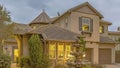 Panorama frame Beautiful tiered fountain at the garden of a home against sky with gray clouds