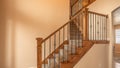 Panorama frame Carpeted stairs with wood handrail and metal railing inside an empty new home
